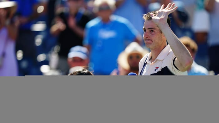 John Isner addresses the crowd after his final U.S. Open appearance.